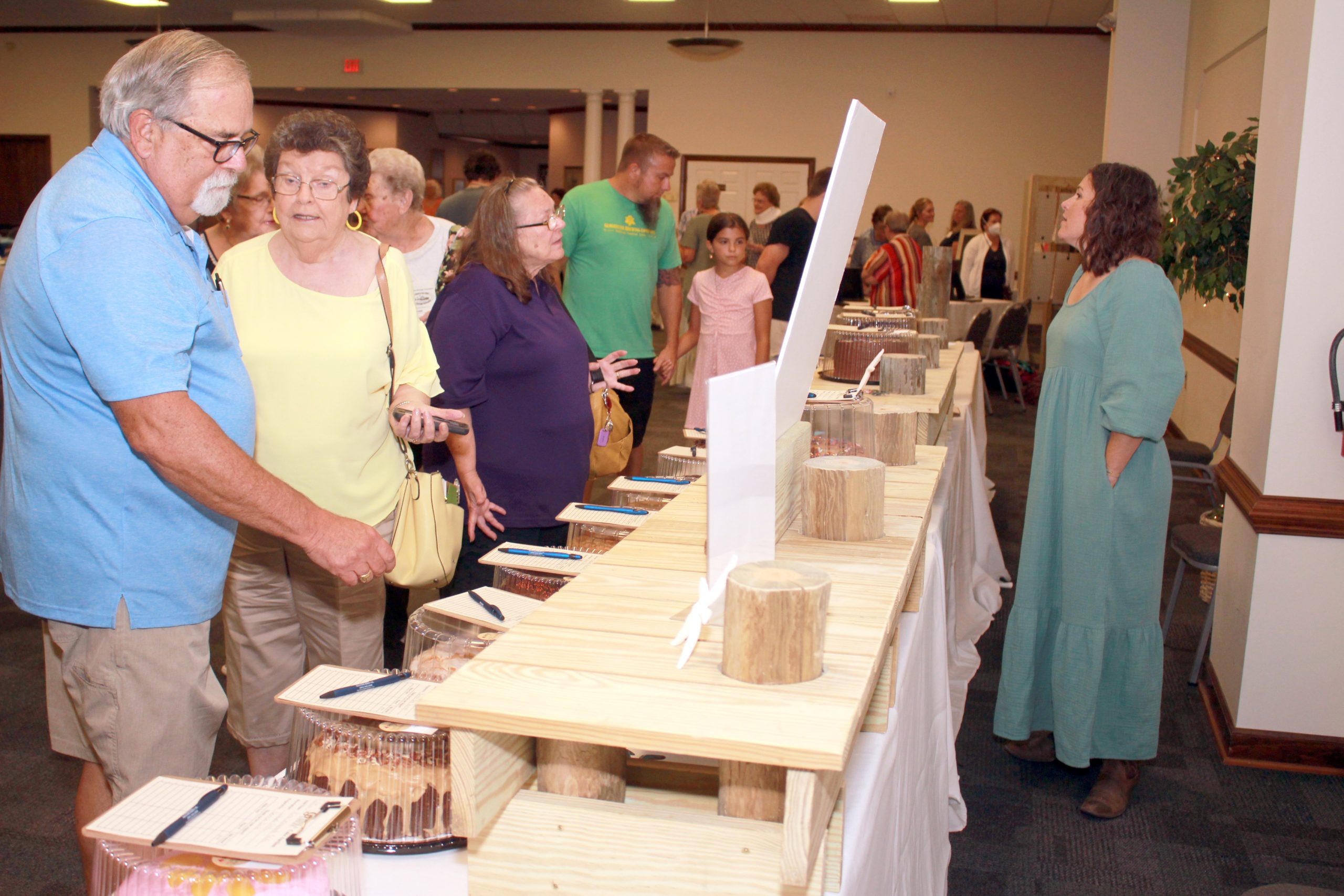 guinea cake auction bidding