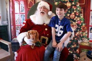Rory Wilbur, 8, and dachsund August