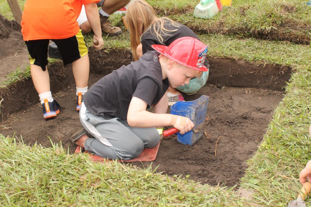 market days 11 james givens of mathews digs for artifacts