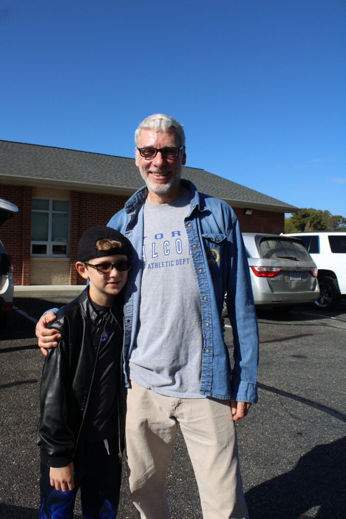 RUBY WILLIAMS / GAZETTE-JOURNAL
Marty Abrahamson and future voter Jesse Abrahamson are shown outside of Gloucester Point Baptist Church.
