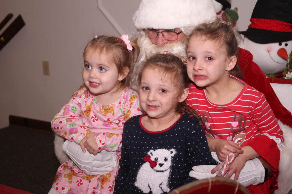 abingdon Jaclyn Griffith, 2, and Lily and Violet Hollis, 5, from left
