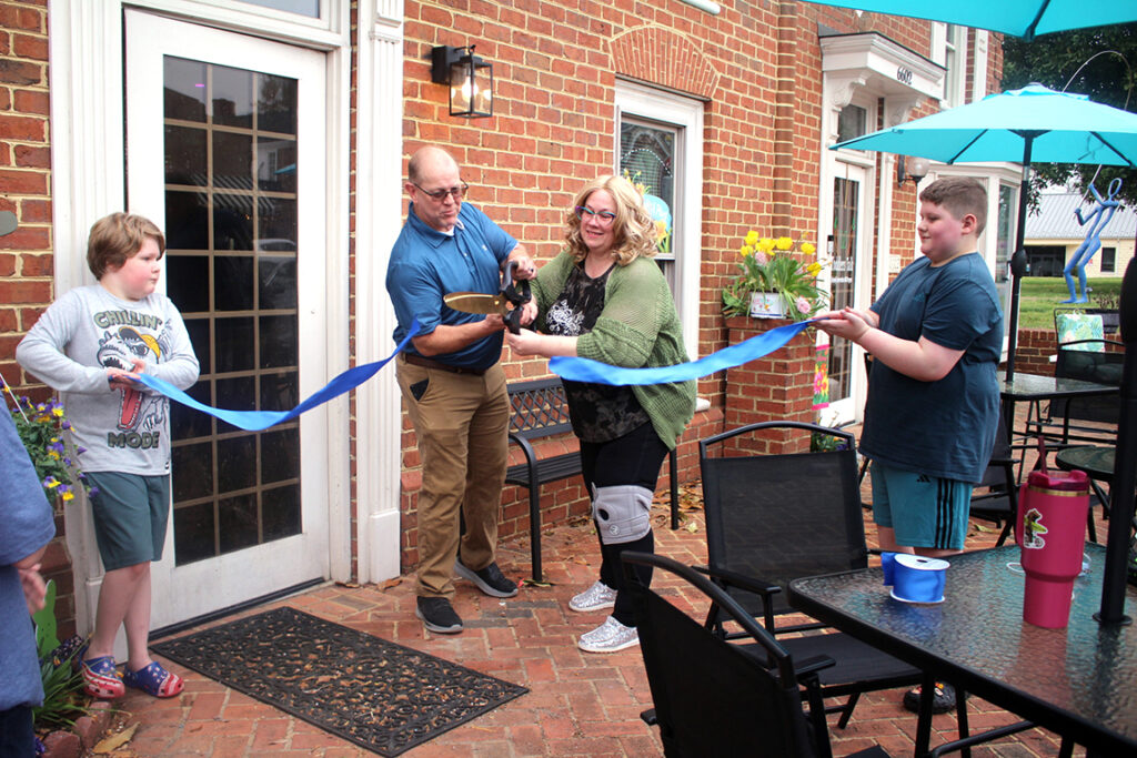business ribbon cutting cereal plug