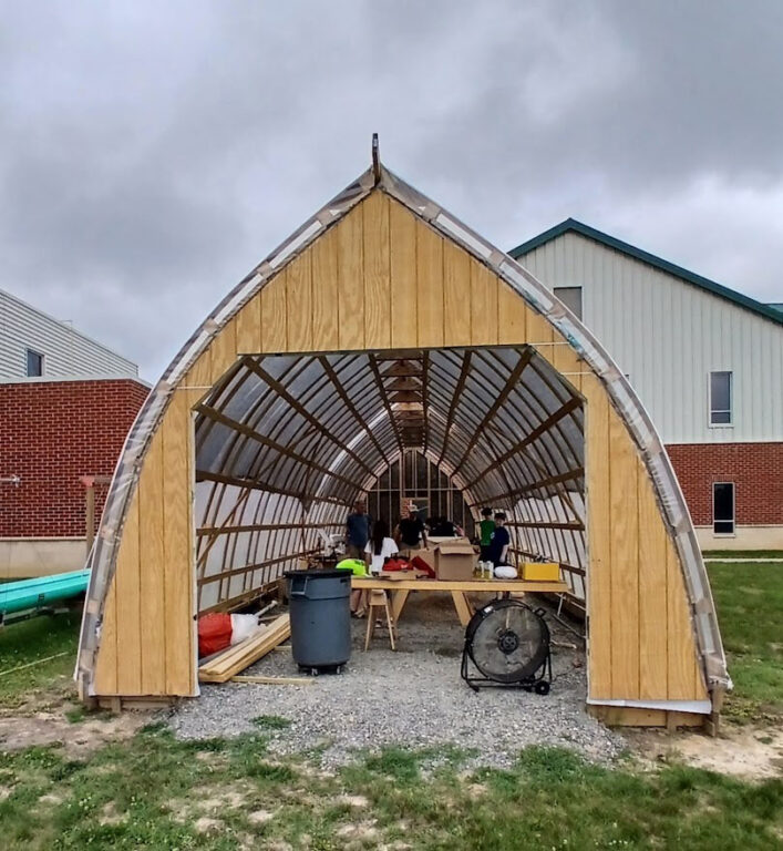 neighbors boat building top